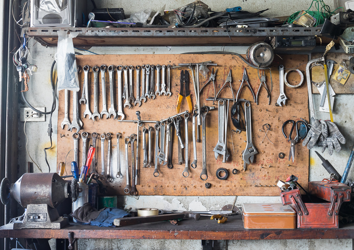 Tool shelf against a wall
